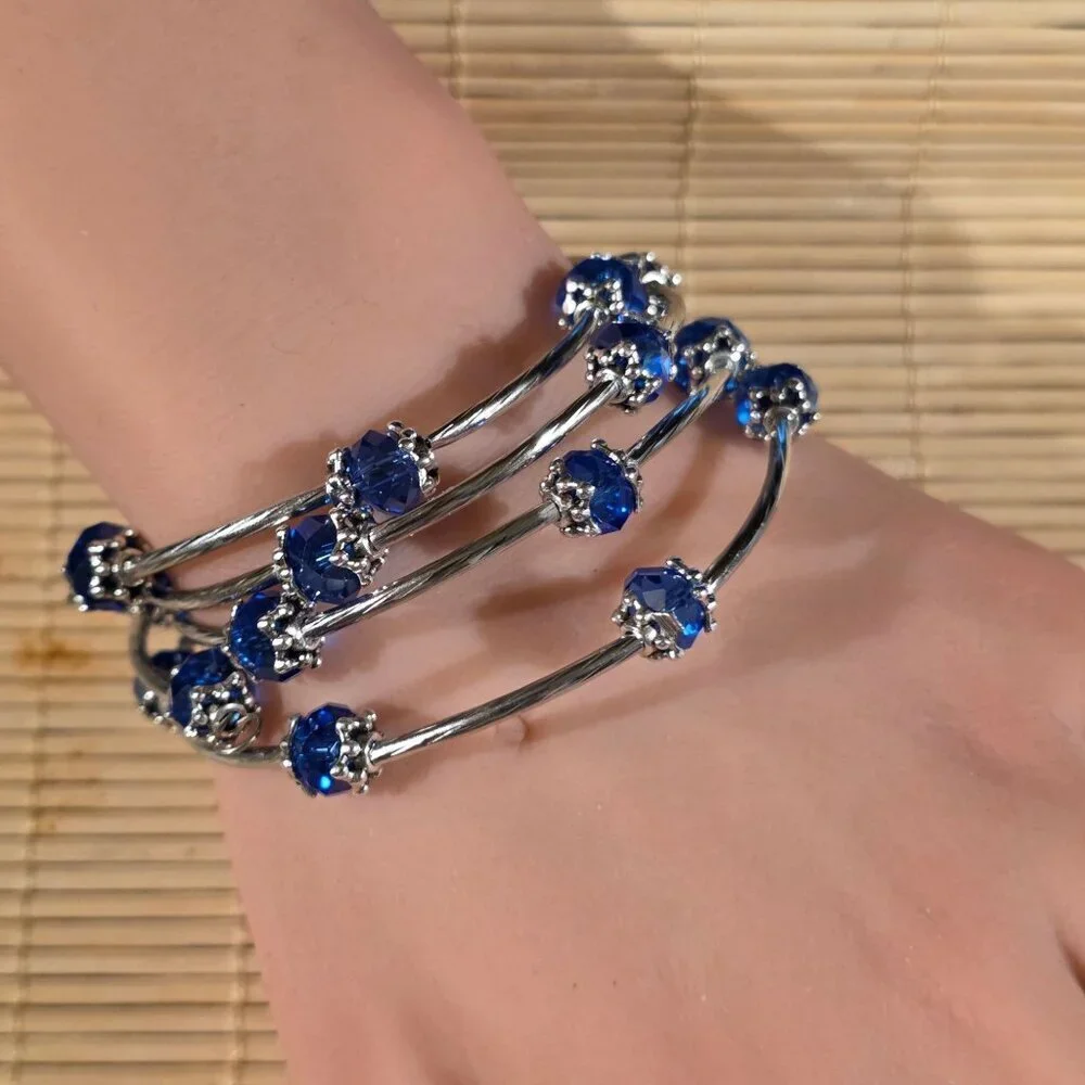 Silver Tone Crystal Wrap Bracelet With Blue Faceted Beads & Filigree Details